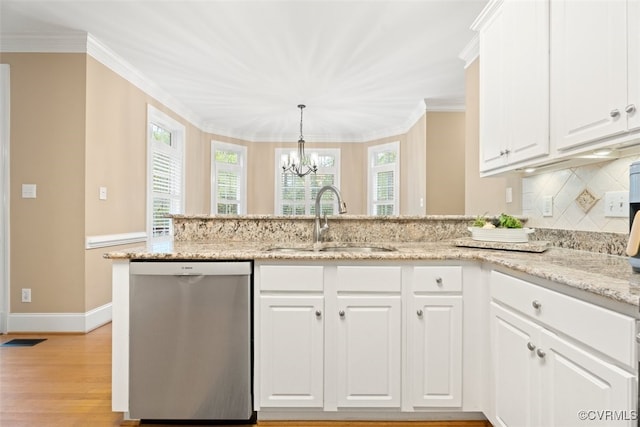 12419 Trumpington Ct, Chesterfield, VA 23838 - kitchen with light wood finished floors, a peninsula, a sink, a notable chandelier, and stainless steel dishwasher