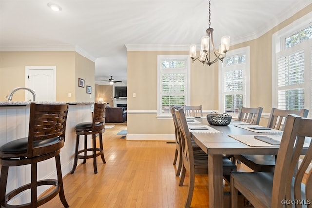 12419 Trumpington Ct, Chesterfield, VA 23838 - dining room with ornamental molding, light wood-style flooring, a wealth of natural light, and baseboards