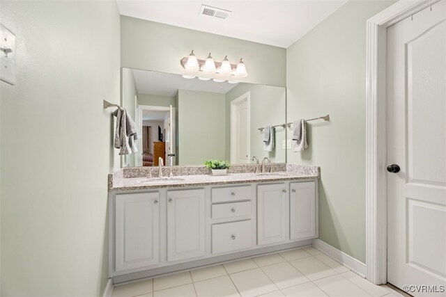 12419 Trumpington Ct, Chesterfield, VA 23838 - full bathroom with a sink, double vanity, baseboards, and visible vents