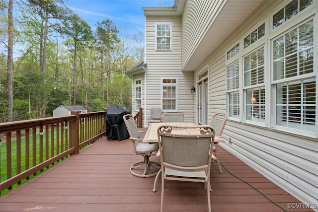 12419 Trumpington Ct, Chesterfield, VA 23838 - deck with a storage shed, outdoor dining space, and a grill
