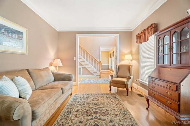 12419 Trumpington Ct, Chesterfield, VA 23838 - living area featuring light wood-type flooring, baseboards, ornamental molding, and stairs