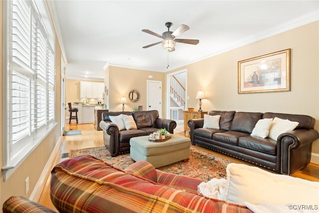 12419 Trumpington Ct, Chesterfield, VA 23838 - living room featuring wood finished floors, a ceiling fan, visible vents, stairway, and ornamental molding
