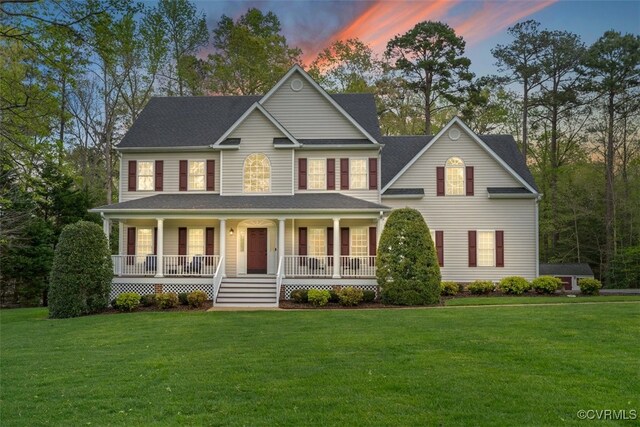 12419 Trumpington Ct, Chesterfield, VA 23838 - view of front of house featuring a porch and a front lawn