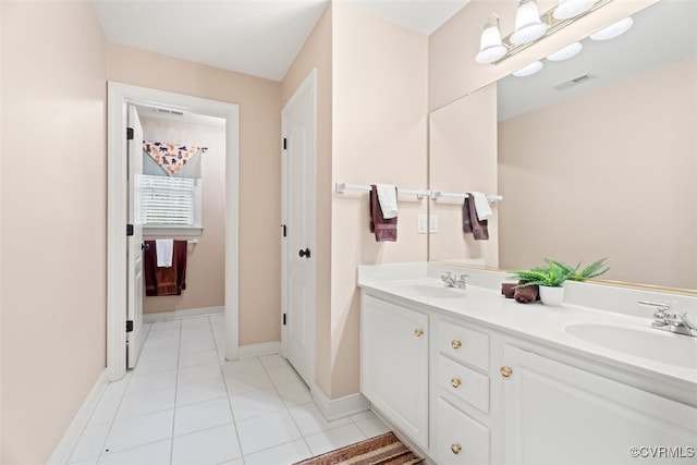 12419 Trumpington Ct, Chesterfield, VA 23838 - full bathroom with a sink, double vanity, visible vents, and tile patterned floors