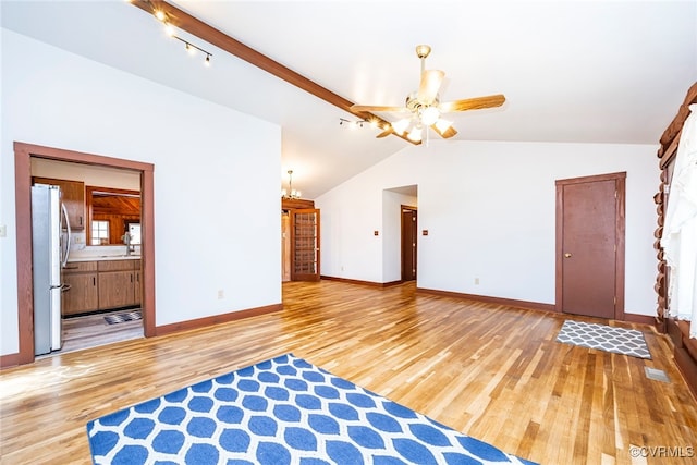 6631 Rural Point Rd, Mechanicsville, VA 23116 - unfurnished living room with light wood finished floors, ceiling fan, baseboards, and track lighting
