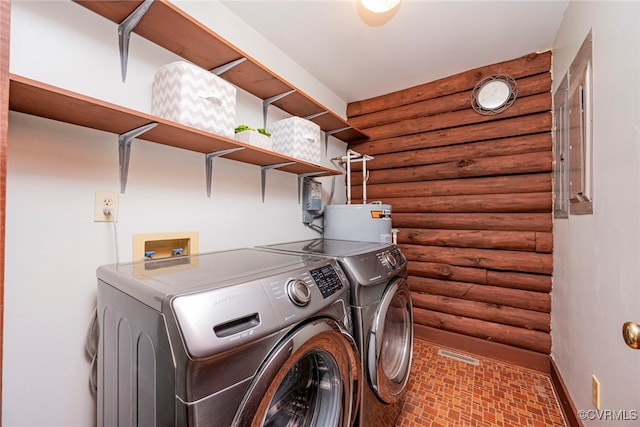 6631 Rural Point Rd, Mechanicsville, VA 23116 - laundry area featuring log walls, washing machine and dryer, water heater, and baseboards