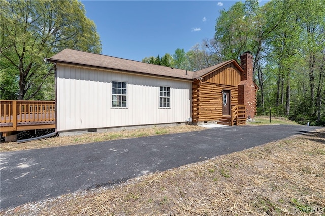 6631 Rural Point Rd, Mechanicsville, VA 23116 - view of front of home featuring crawl space, a chimney, a wooden deck, and log siding