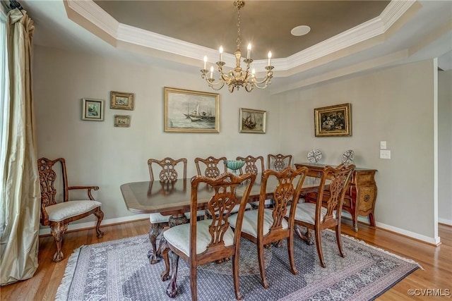 3801 Duckling Walk, Glen Allen, VA 23060 - dining room with a tray ceiling, a chandelier, crown molding, wood finished floors, and baseboards