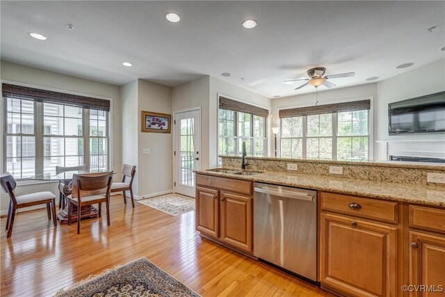 3801 Duckling Walk, Glen Allen, VA 23060 - kitchen featuring dishwasher, a sink, light wood-style floors, ceiling fan, and light stone counters