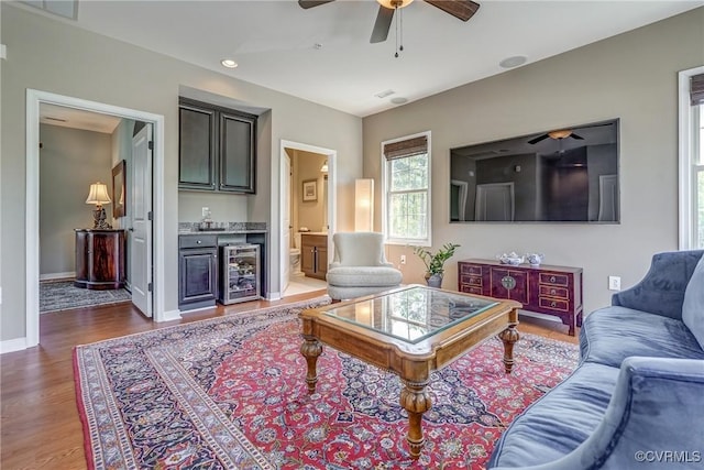 3801 Duckling Walk, Glen Allen, VA 23060 - living room featuring a bar, a ceiling fan, wood finished floors, wine cooler, and baseboards