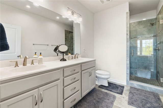 2248 Libbie Lake W Street A, Henrico, VA 23230 - bathroom featuring a shower stall, toilet, a sink, and double vanity