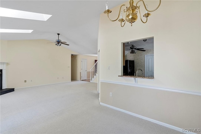 14530 Hancock Ridge Ct, Chesterfield, VA 23832 - unfurnished living room featuring ceiling fan, a skylight, stairs, a chandelier, and vaulted ceiling