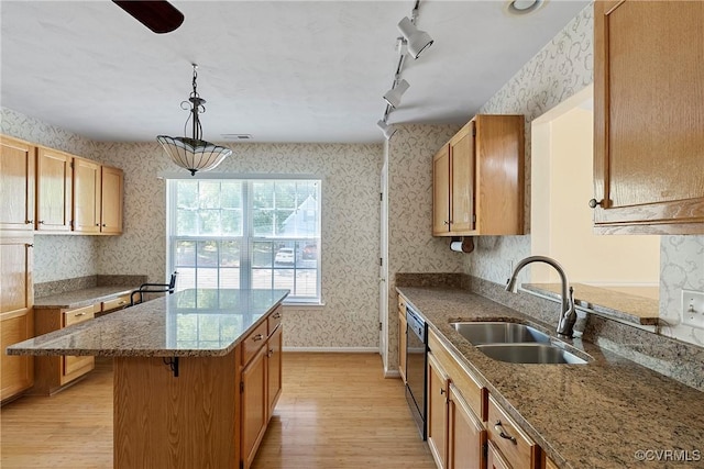 14530 Hancock Ridge Ct, Chesterfield, VA 23832 - kitchen with wallpapered walls, a sink, light wood-style flooring, a kitchen island, and black dishwasher