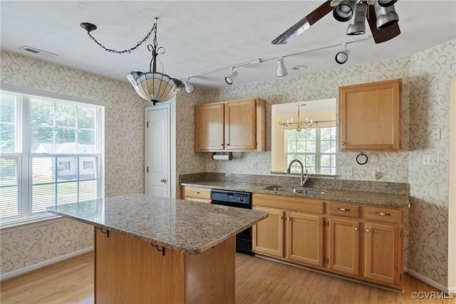 14530 Hancock Ridge Ct, Chesterfield, VA 23832 - kitchen with a sink, light wood-style floors, wallpapered walls, dishwasher, and a chandelier
