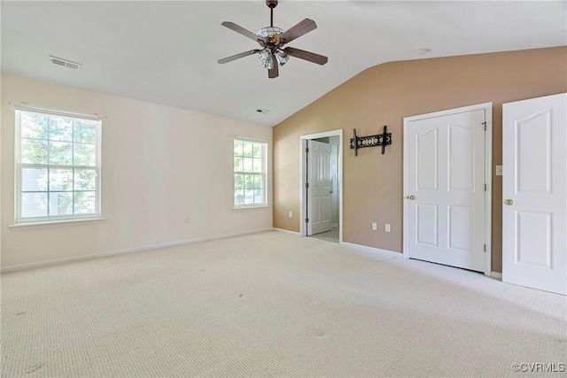 14530 Hancock Ridge Ct, Chesterfield, VA 23832 - unfurnished bedroom with baseboards, lofted ceiling, light carpet, and a ceiling fan