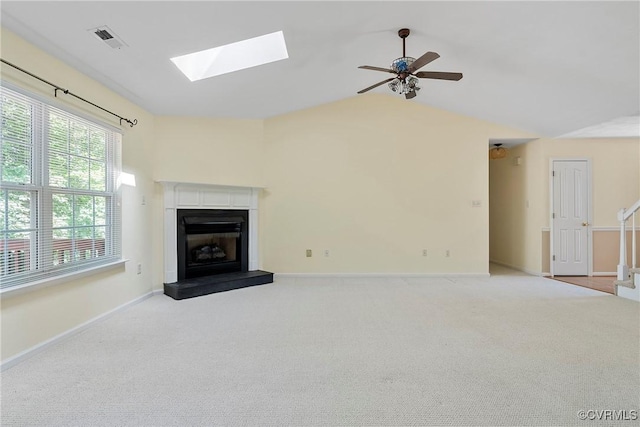 14530 Hancock Ridge Ct, Chesterfield, VA 23832 - unfurnished living room with a skylight, a fireplace with raised hearth, baseboards, a ceiling fan, and carpet