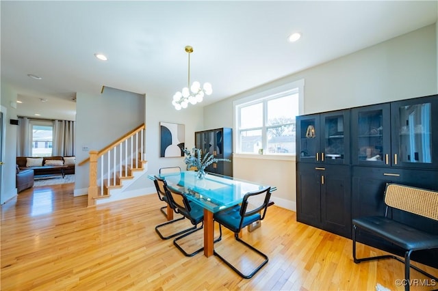 300 W 25th St, Richmond, VA 23225 - dining area featuring stairway, an inviting chandelier, light wood-style flooring, baseboards, and recessed lighting