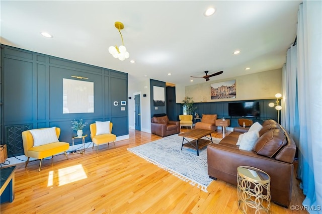 300 W 25th St, Richmond, VA 23225 - living area with recessed lighting, wood finished floors, a decorative wall, and a ceiling fan