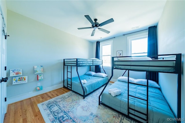 300 W 25th St, Richmond, VA 23225 - bedroom with ceiling fan, baseboards, and wood finished floors