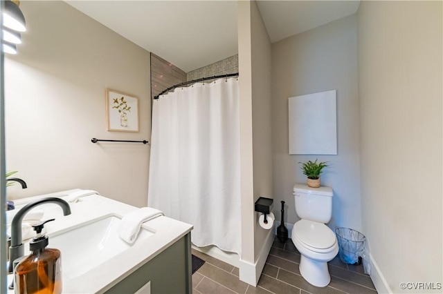 300 W 25th St, Richmond, VA 23225 - bathroom with toilet, tile patterned floors, vanity, and curtained shower
