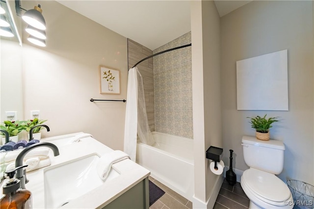 300 W 25th St, Richmond, VA 23225 - full bath featuring shower / bath combo with shower curtain, toilet, vanity, and tile patterned floors