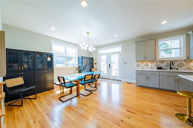 300 W 25th St, Richmond, VA 23225 - dining room with recessed lighting, french doors, and light wood-style flooring