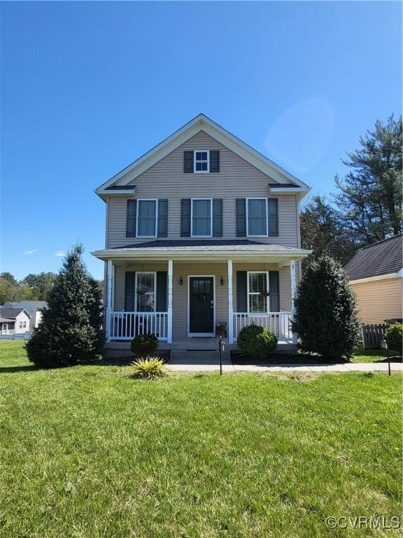 640 Coniston Manor Dr, Gordonsville, VA 22942 - view of front facade featuring a front lawn and a porch