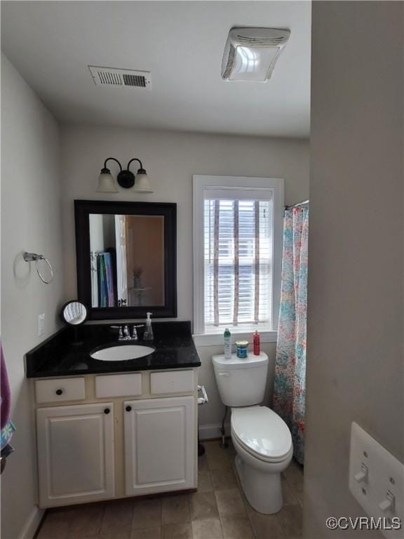 640 Coniston Manor Dr, Gordonsville, VA 22942 - bathroom with tile patterned flooring, visible vents, toilet, and vanity