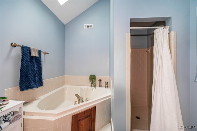 3112 Brookemoor Ct, Glen Allen, VA 23060 - bathroom featuring vaulted ceiling, a shower stall, a garden tub, and visible vents