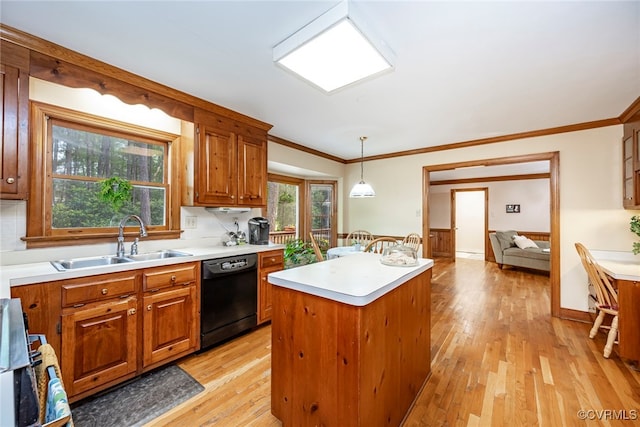 3112 Brookemoor Ct, Glen Allen, VA 23060 - kitchen with a sink, light wood-style floors, a kitchen island, black dishwasher, and brown cabinetry