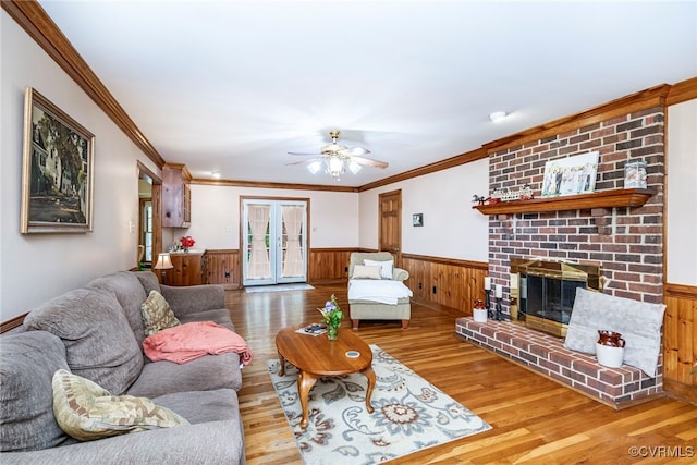 3112 Brookemoor Ct, Glen Allen, VA 23060 - living room with ceiling fan, a wainscoted wall, light wood-style floors, and ornamental molding