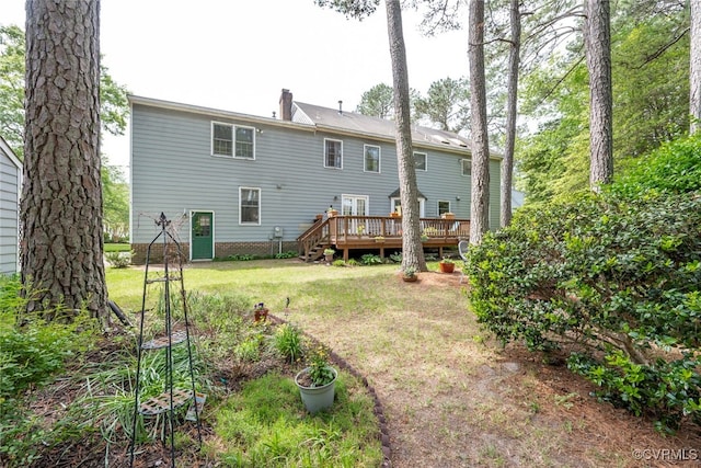 3112 Brookemoor Ct, Glen Allen, VA 23060 - rear view of house featuring a chimney, a deck, and a lawn