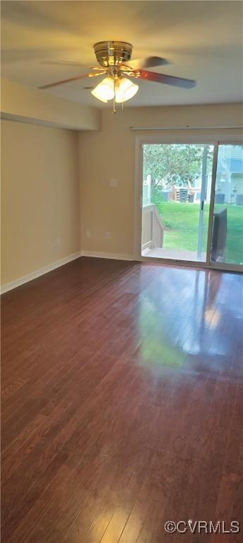 9609 Paddock Grove Ct, Chesterfield, VA 23832 - spare room featuring wood finished floors, a ceiling fan, and baseboards