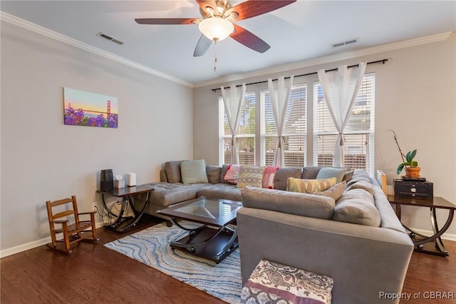 living area with ceiling fan, baseboards, wood finished floors, and visible vents