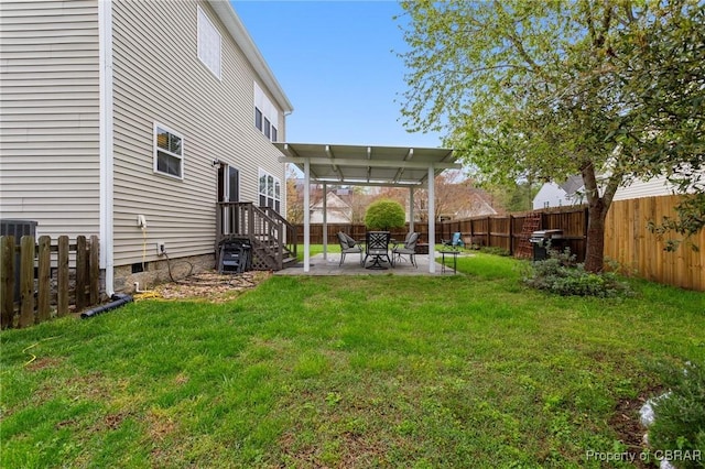 view of yard with a fenced backyard and a patio