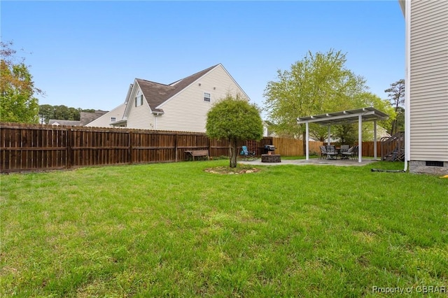 view of yard featuring a patio area and a fenced backyard
