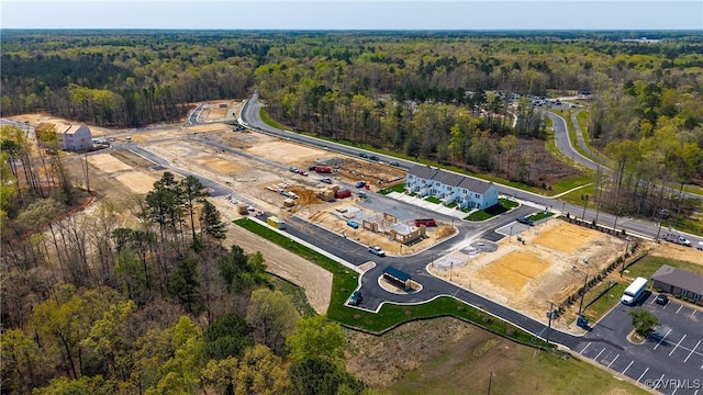 bird's eye view featuring a forest view