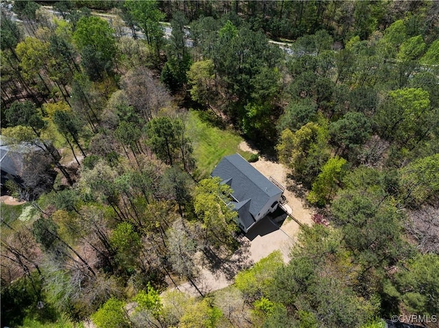bird's eye view featuring a view of trees