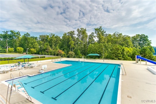 community pool featuring a patio