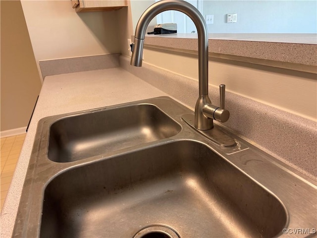 interior details featuring a sink