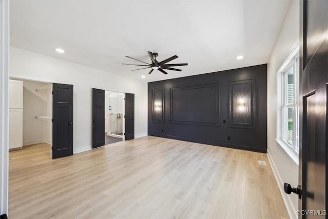 unfurnished bedroom with baseboards, recessed lighting, light wood-style floors, and ceiling fan