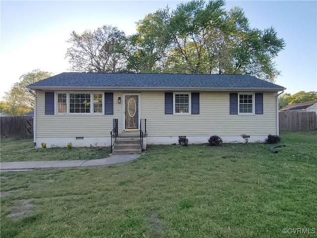 ranch-style home featuring crawl space, a front lawn, fence, and a shingled roof