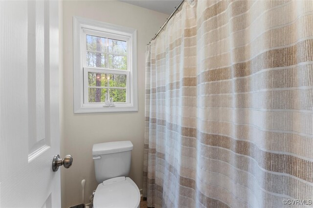 bathroom featuring toilet
