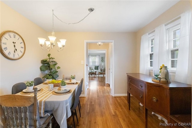 16 Lakeview Dr, Newport News, VA 23602 - dining area with light wood-style floors and a chandelier