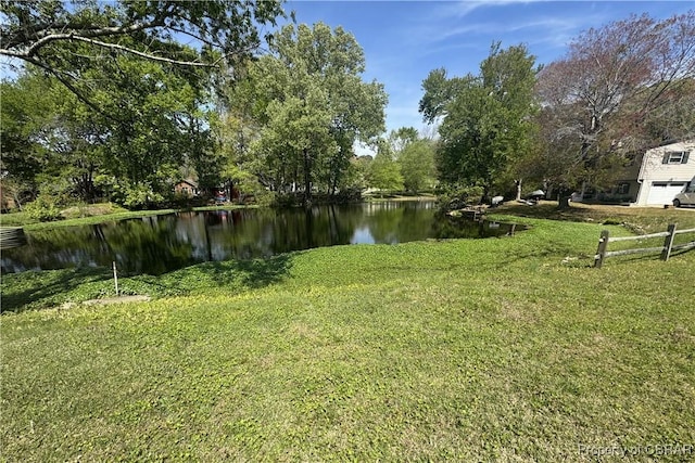 16 Lakeview Dr, Newport News, VA 23602 - view of green lawn with a water view and a garage