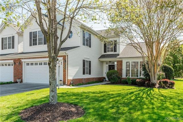view of front of property with brick siding, an attached garage, a shingled roof, a front yard, and aphalt driveway