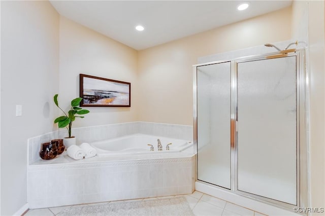 full bathroom featuring a bath, recessed lighting, tile patterned floors, and a stall shower
