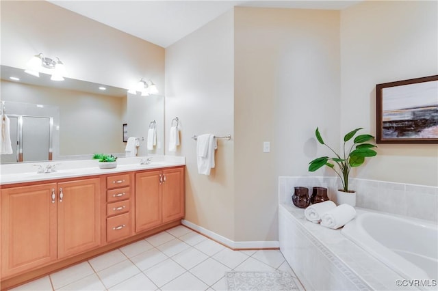 10317 White Marsh Rd, Henrico, VA 23060 - bathroom with double vanity, a garden tub, tile patterned floors, and a shower stall