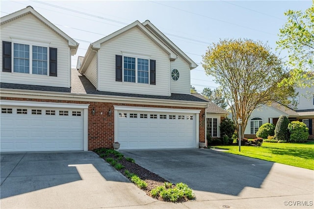 10317 White Marsh Rd, Henrico, VA 23060 - traditional-style home featuring an attached garage, driveway, brick siding, and a front lawn