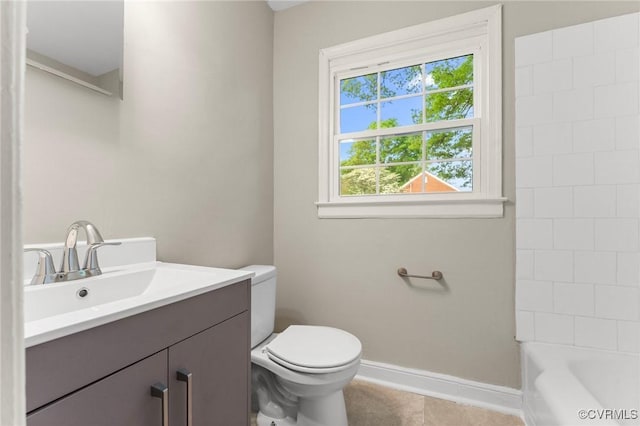 full bathroom with baseboards, tile patterned floors, vanity, and toilet
